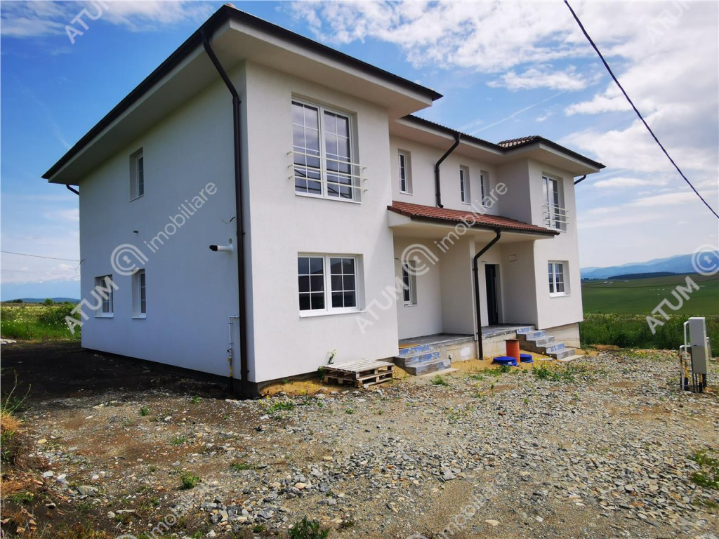 De inchiriat casa la cheie cu 5 camere 3 bai si teren langa