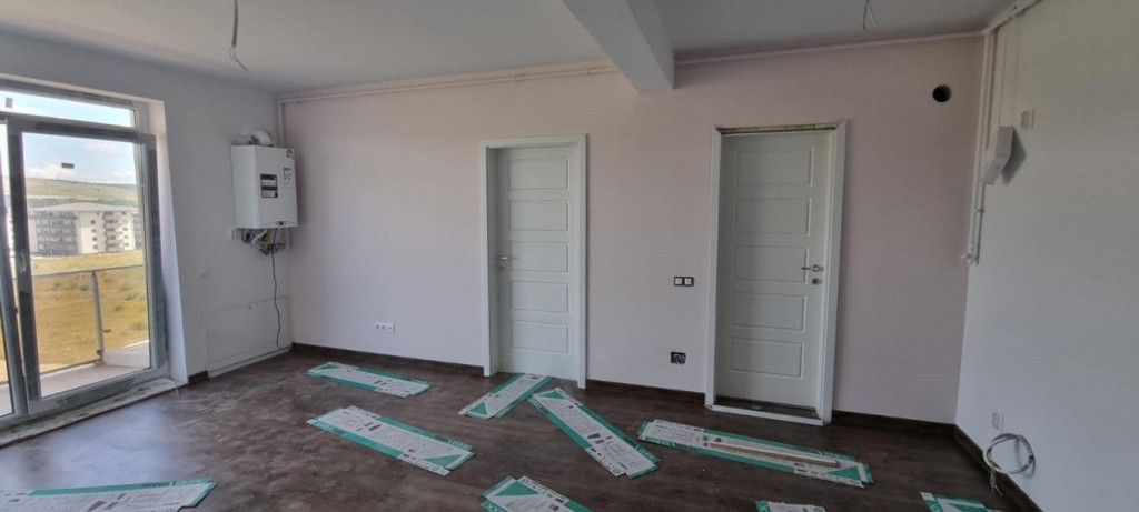 Apartament finisat cu 3 camere,55 mp,incalzire in pardoseala