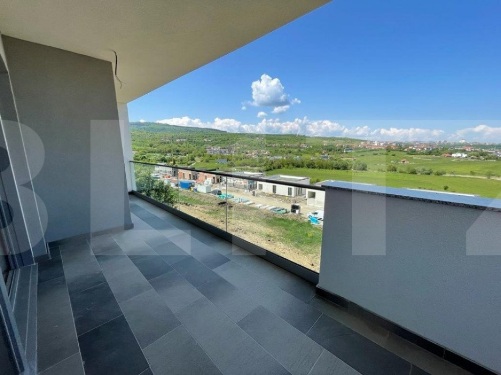 Casa cuplata, 200 mp utili si 260 mp teren, situata in Borha