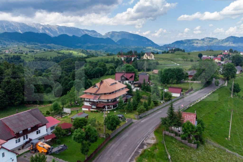 Pensiune de 570 mp, 14 camere cu bai proprii, teren de 2370