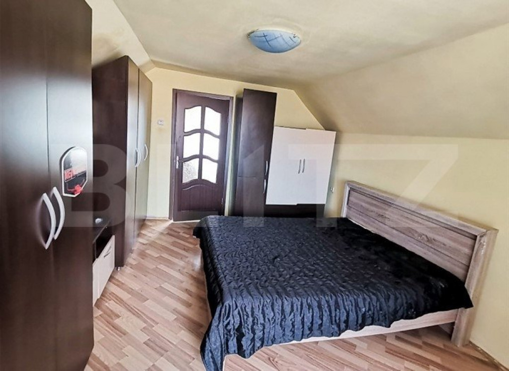 Casa cu 4 camere si curte cu 2 locuri de parcare, zona Iris