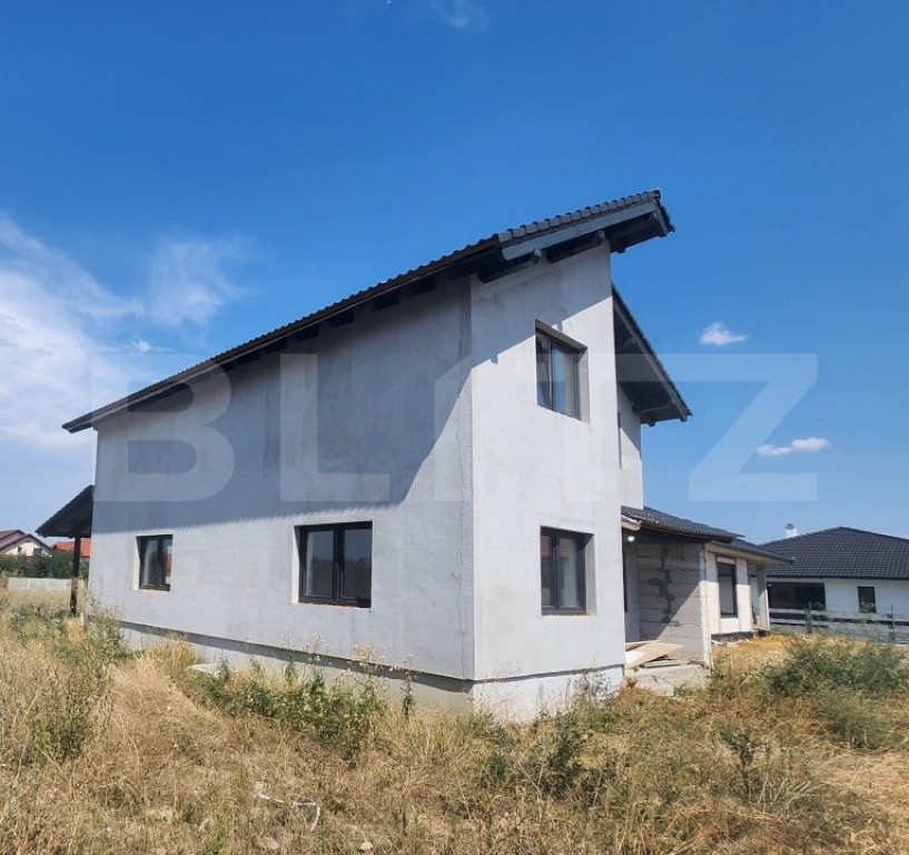 Casa individuala cu 4 camere, 142mp utili,400 mp teren zona