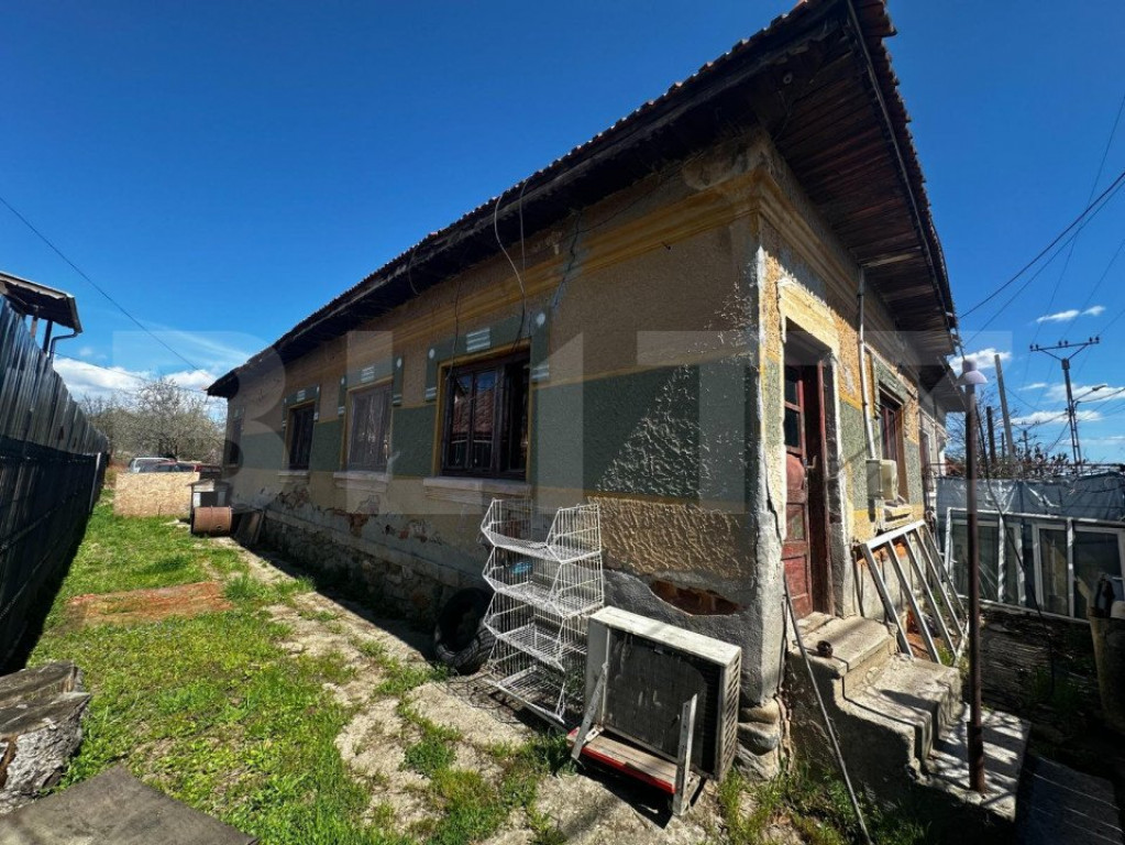 Casa plan parter si 1500 mp teren, zona Dragoieni