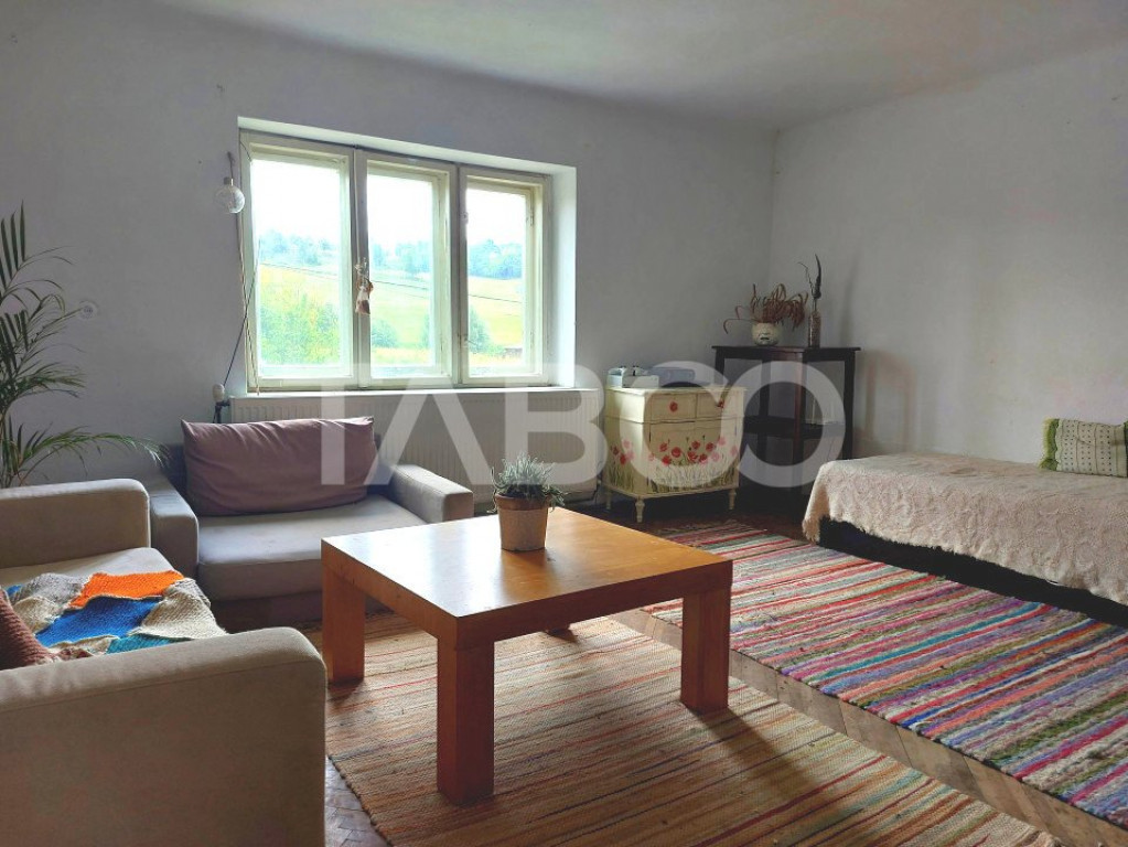 Casa in Marpod 30 km de Sibiu toate utilitatile 3 camere ter