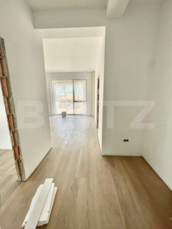 Apartament nou de 2 camere, 52 mp, gradina si parcare, zona