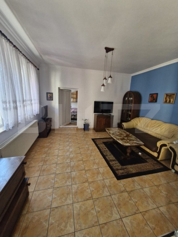 Casa individuala 4 camere, 120 mp, curte, garaj zona central