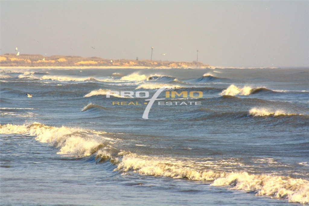 Teren 4200mp. cu deschidere la Soseaua asfaltata - Plaja Cor