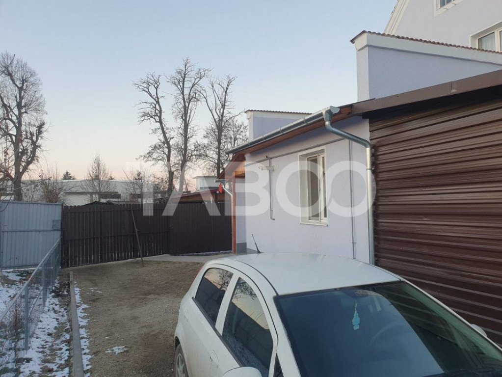 Casa 2 camere 70 mp utili + 38 mp garaj renovata complet in