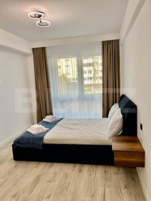 Apartament de inchiriat, cu 2 camere, 58 mp, zona-Ansamblul