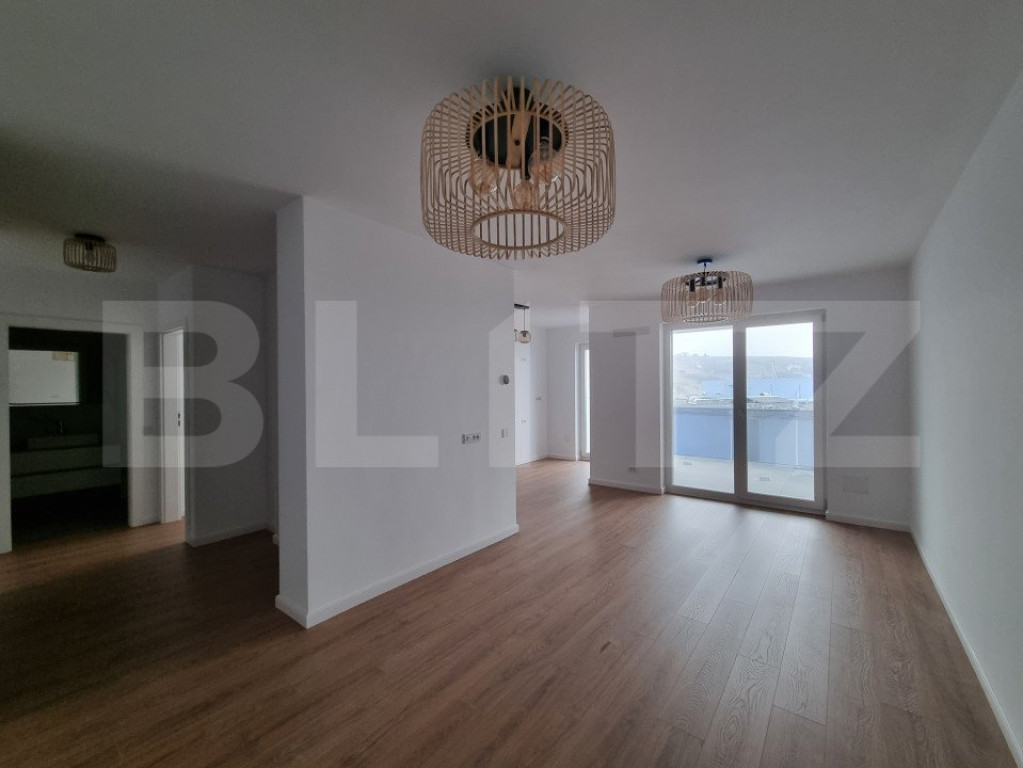 Apartament cu 2 camere finisat, 58 mp, bloc nou, etaj interm