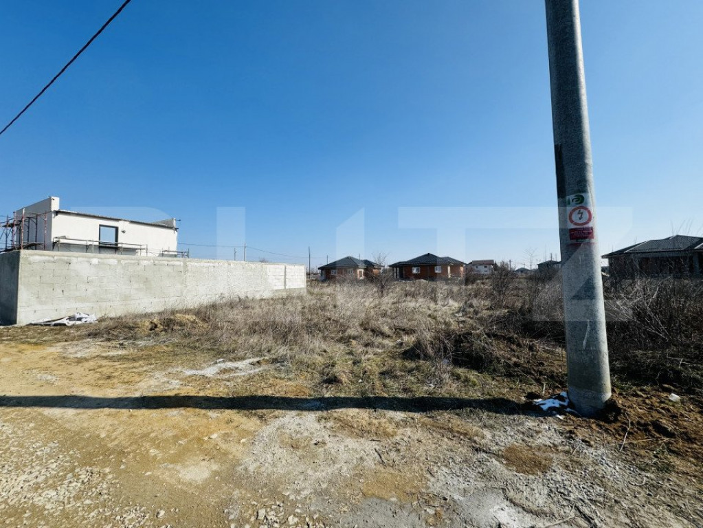 Teren intravilan, 420 mp, front 28 mp, in spatele cartierulu