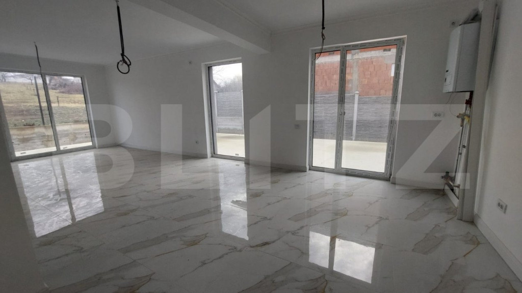 Casă finisată, 4 camere, 100 mp utili, teren 400 mp, zona