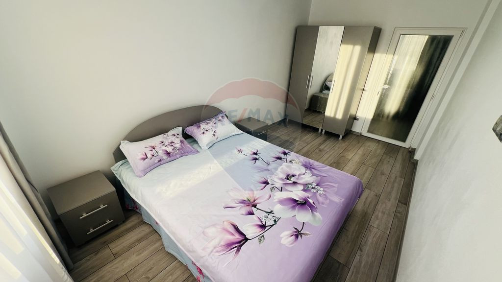 Apartament cu 2 dormitoare de închiriat + loc de parcare