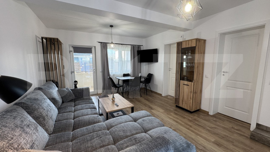 Casă P + E parte din triplex, 94 mp, 122 mp teren, zona Dam