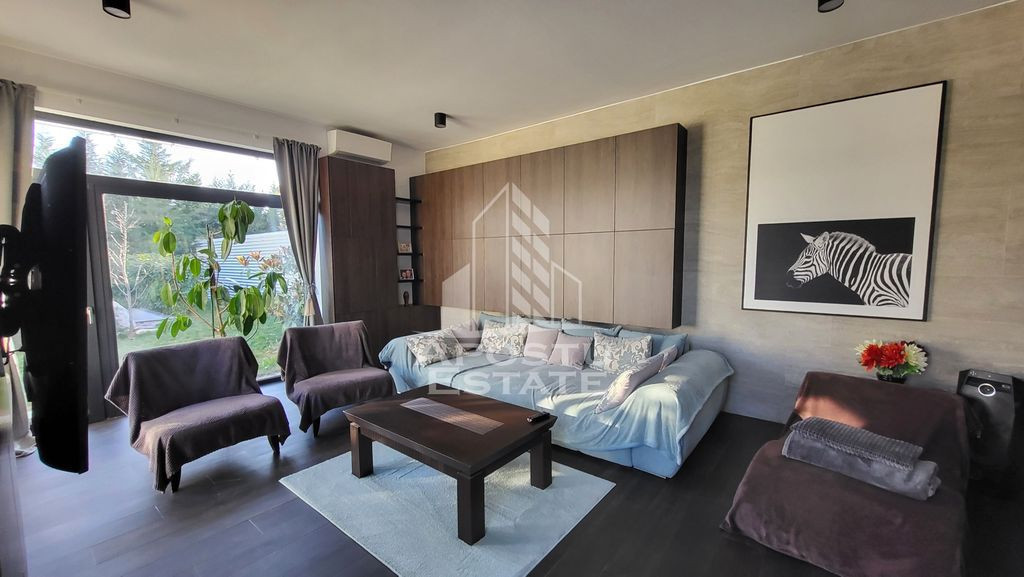 Casa individuala moderna pe parter,cu 4 camere si garaj,C...