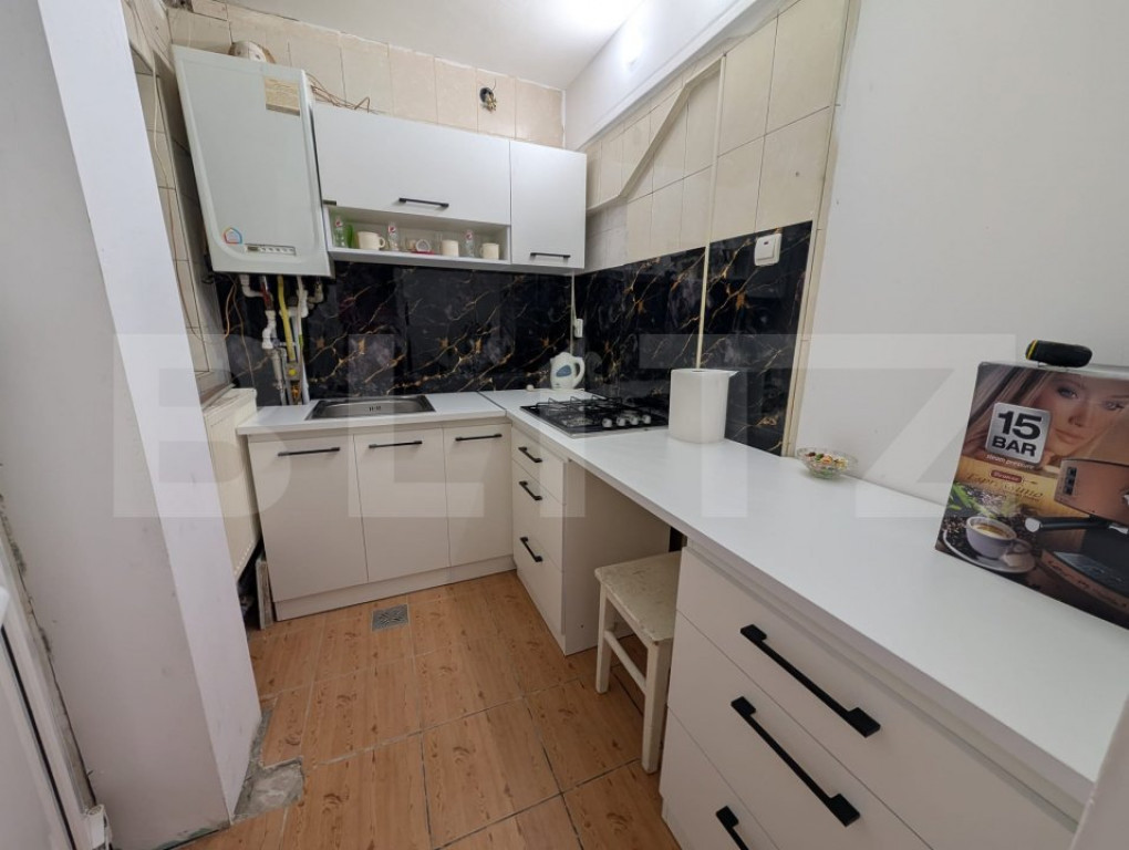 Garsoniera la parter cu intrare separata direct din curte!