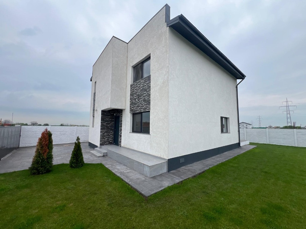 Casa cu pompa de caldura si panouri solare 5 kW