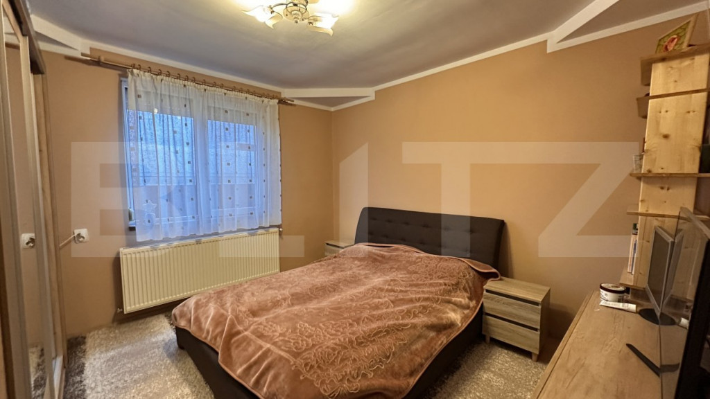 Casă individuală, 3 camere, curte amenajată, garaj