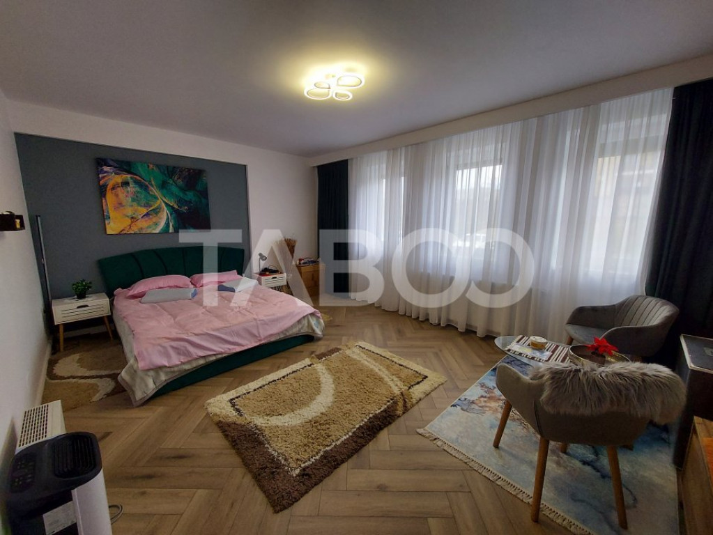 Garsoniera decomandata de vanzare 38 mpu loc de parcare balc