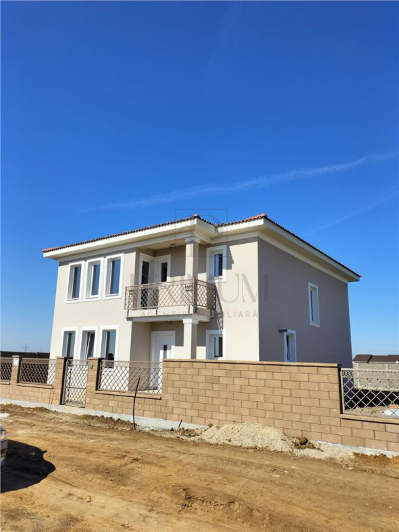 Casa individuala - garaj- finisaje premium - asfalt - toate