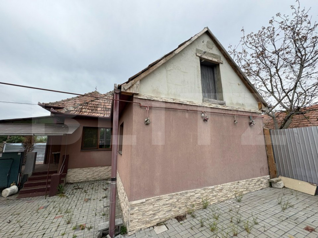 Casa individuala cu 3 camere,110 mp utili, 1000 mp teren,Bla