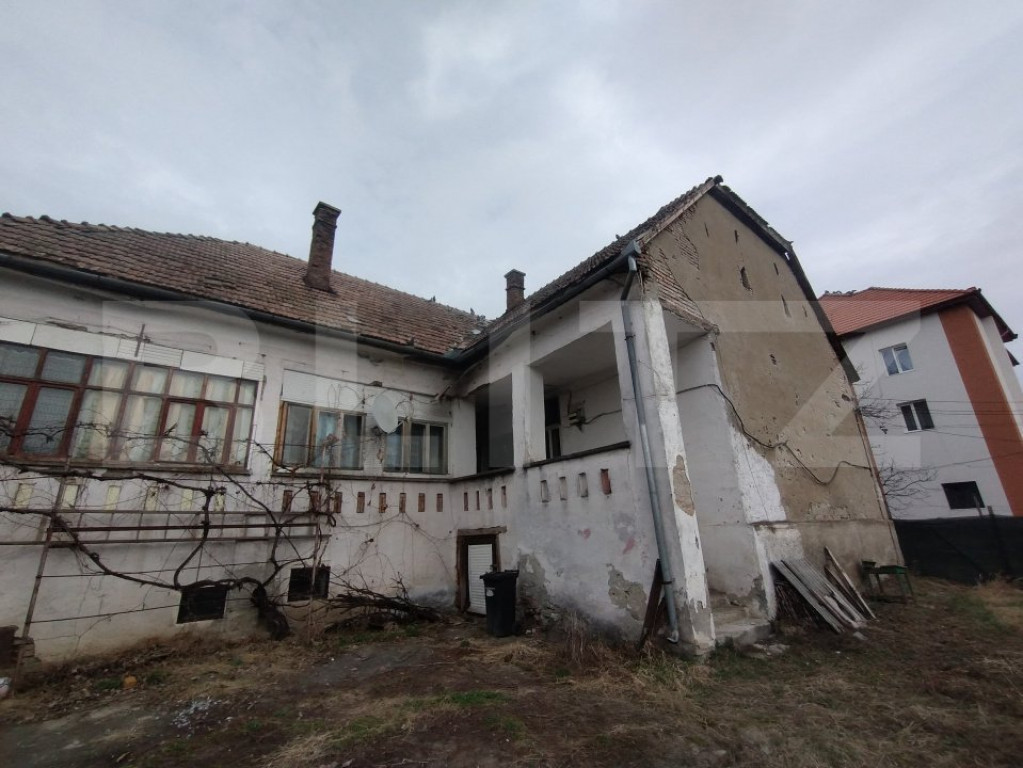 Casa 50 mp,2 camere,curte comuna,teren 350mp,Renovabila,comu