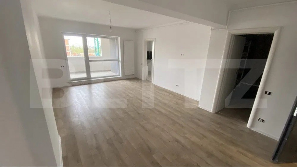 Garsoniera spatioasa , 48 mp, zona Tractorul