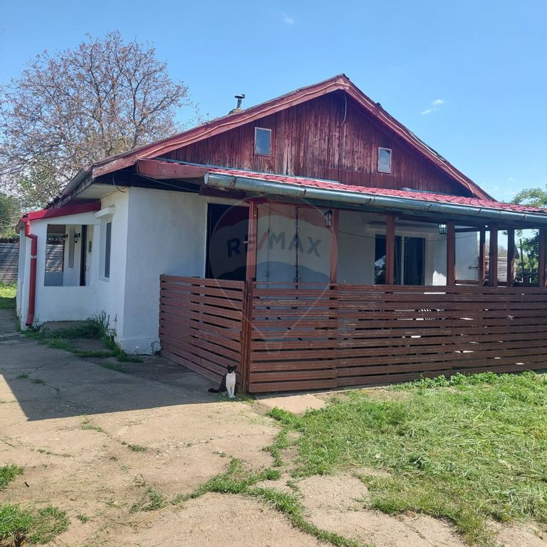 Casă de vânzare în apropiere de Bucuresti – teren ge...