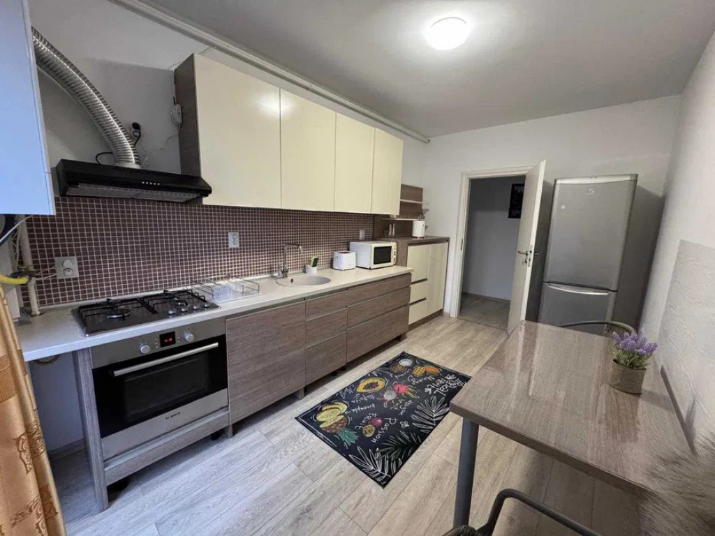 De închiriat – Apartament 2 camere complet mobilat și ut