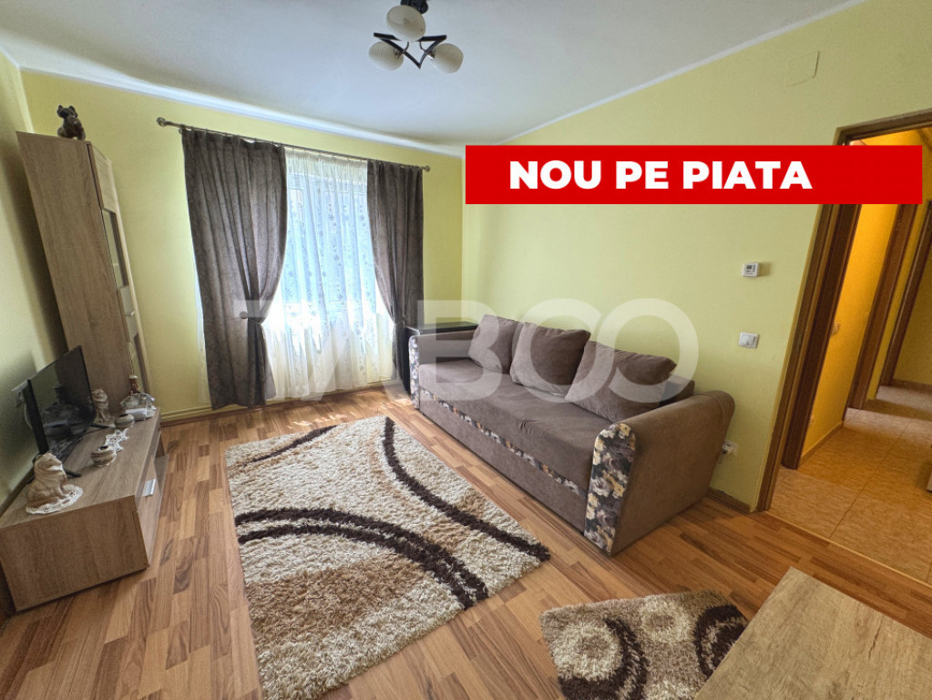 Apartament renovat de vanzare cu 3 camere etaj 1 zona Rahove