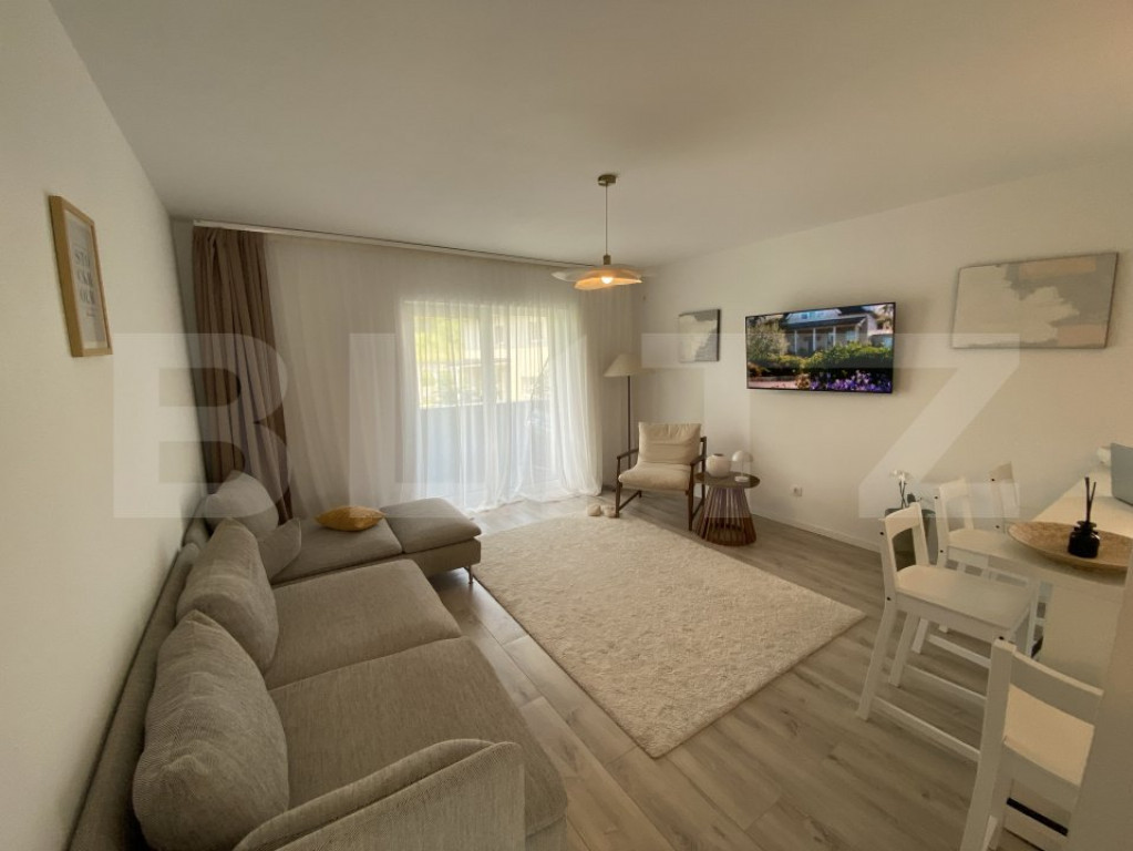 Apartament de vanzare, cu 3 camere, garaj si gradina, 105 mp