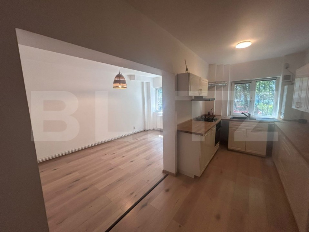 Apartament cu 2 camere, centrala si AC, parter, cartier 1 Ma