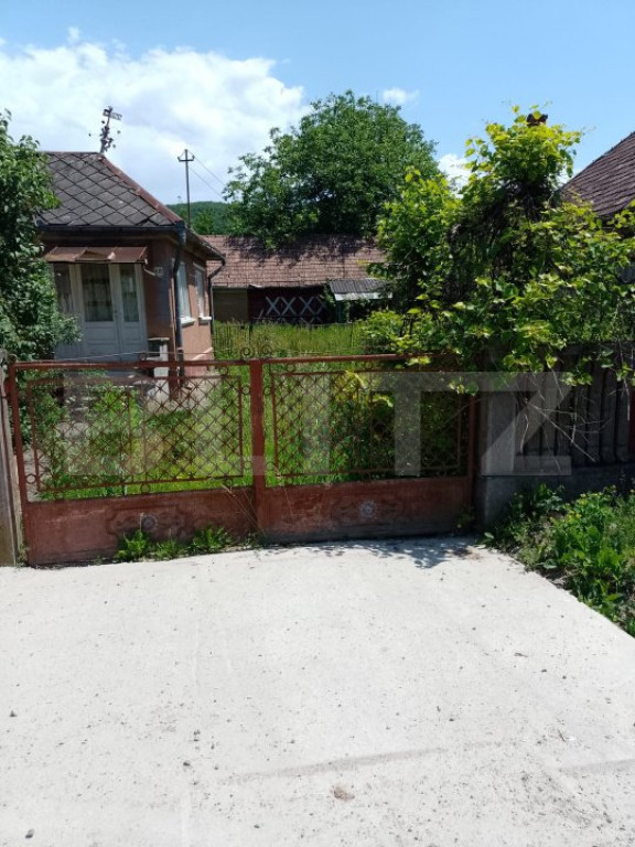Casa 3 camere,80 mp utili si 970 mp de teren,zona Reteag