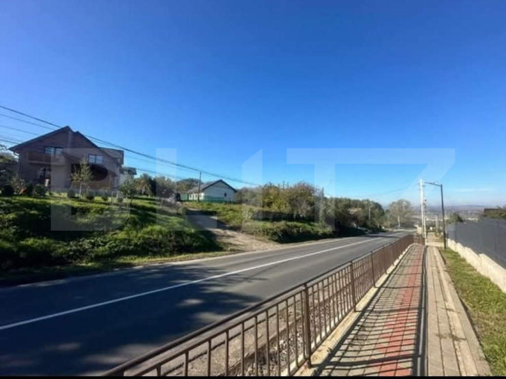 Teren 400 mp intravilan, strada principala, 2 deschideri, To