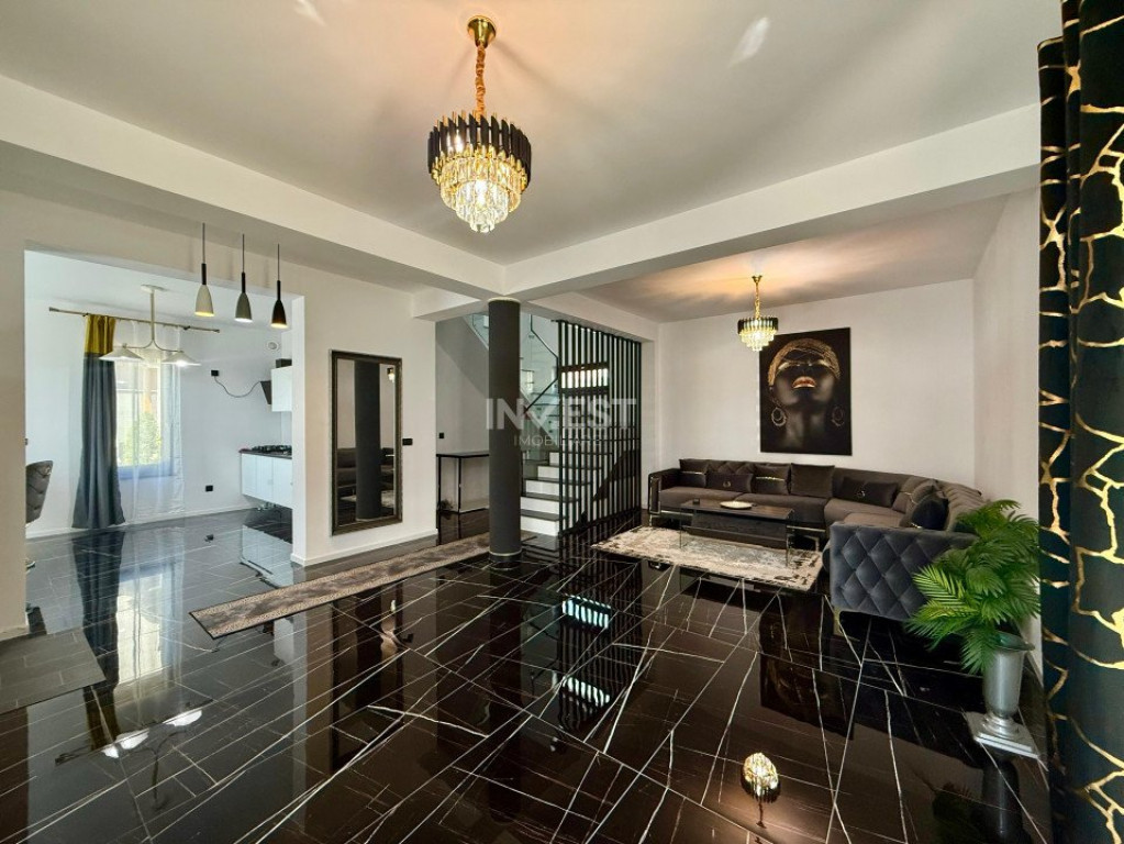 Vilă de vânzare cu design deosebit în cartierul Bucium