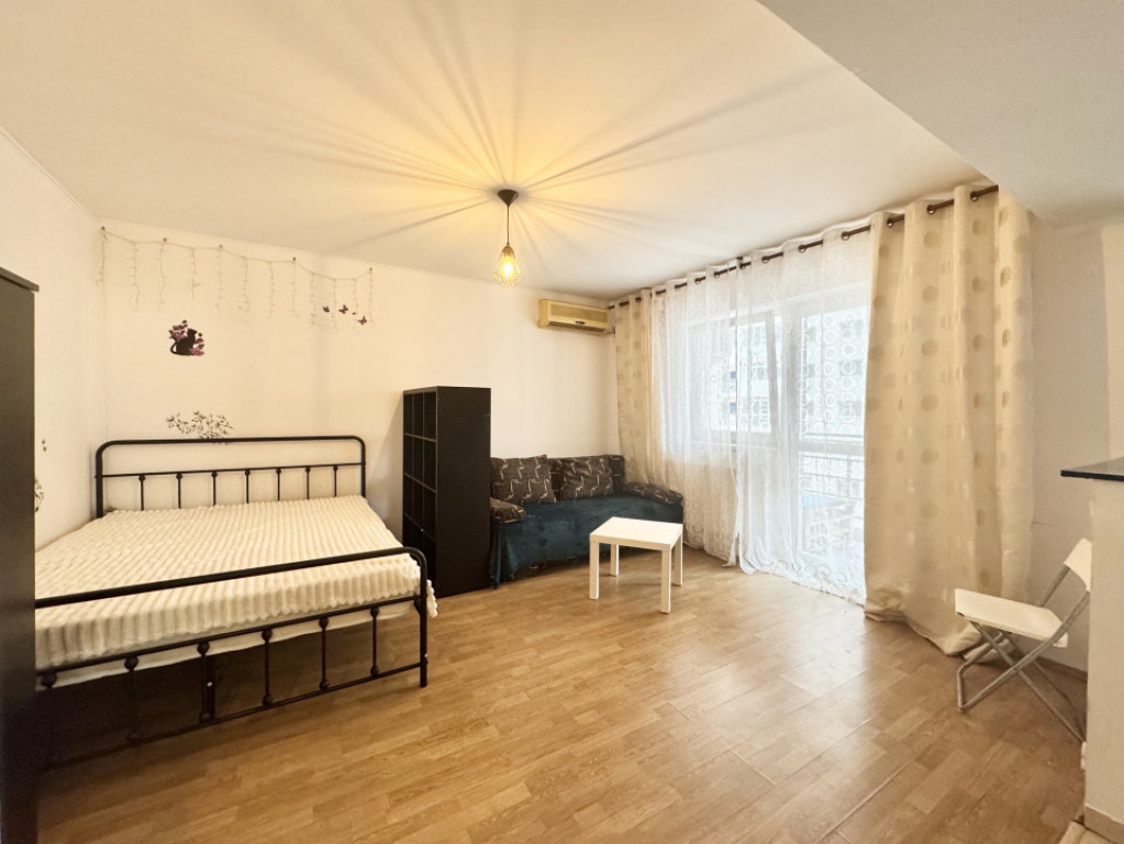 Garsoniera cu centrala proprie de inchiriat in spate la RIN