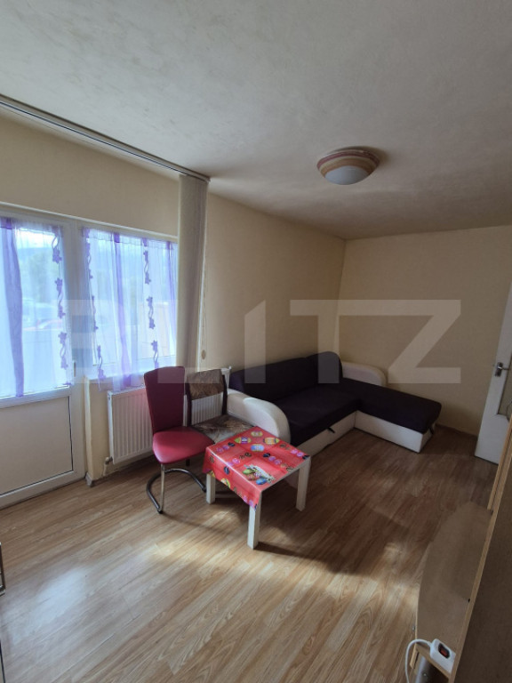 Garsonieră cu balcon închis, centrală proprie, boxă și