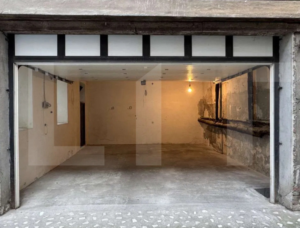 Garaj ultracentral cu statut de apartament – Palatul Neuma