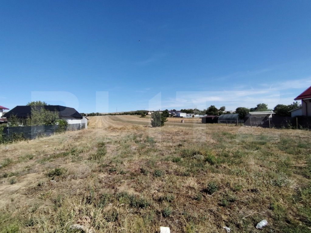 Teren intravilan, 1000 mp, la strada principala, zona Simnic