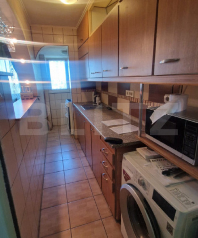 Garsoniera mobilata, etaj intermediar, parcare, beci luminoa