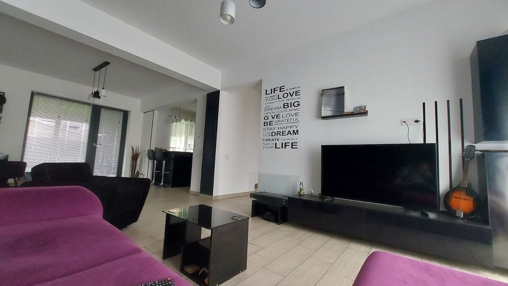 Casă modernă cu 3 dormitoare, 2 locuri parcare, terasă...