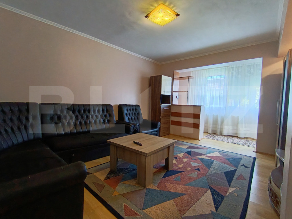 Apartament cu 3 camere și living în suprafață de 65 mp