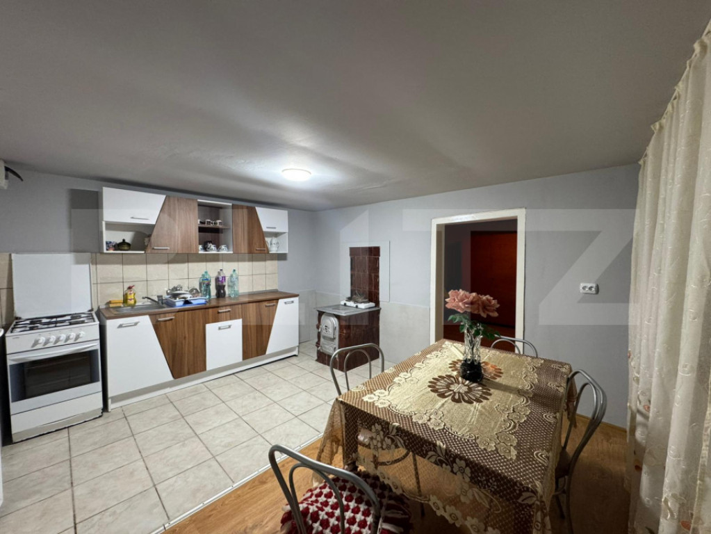 Casa cu 4 camere, 117 mp, teren generos de 5594 mp, in Crisc