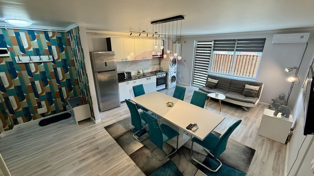 Apartament cochet de închiriat cu loc de parcare si curte