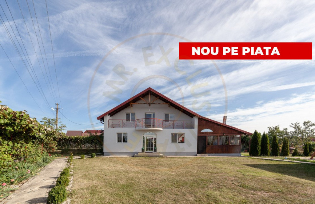 Casa cu teren generos si gradina spectaculoasa – Comuna Cu