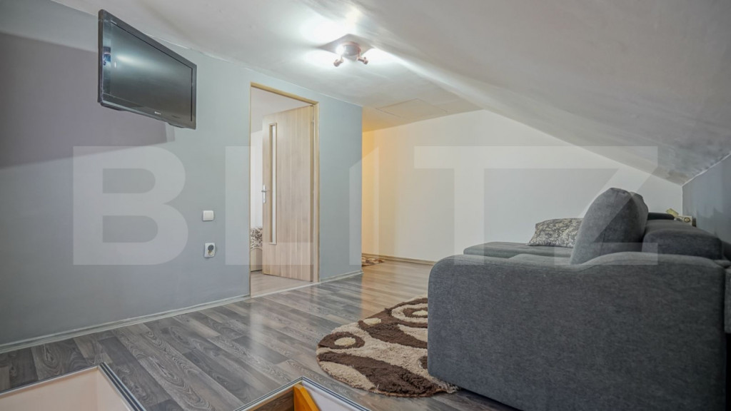 Casa cu 7 camere, 150 mp utili, garaj si curte amenajata, zo