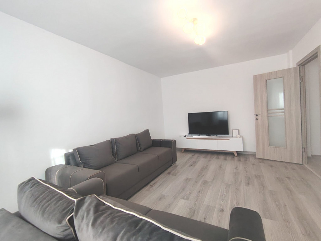 Apartament modern central-cu loc parcare privat