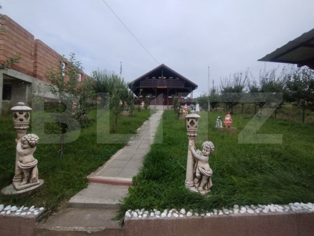 Casa de vacanta din lemn,60 mp,foisor,teren 686 mp extravila