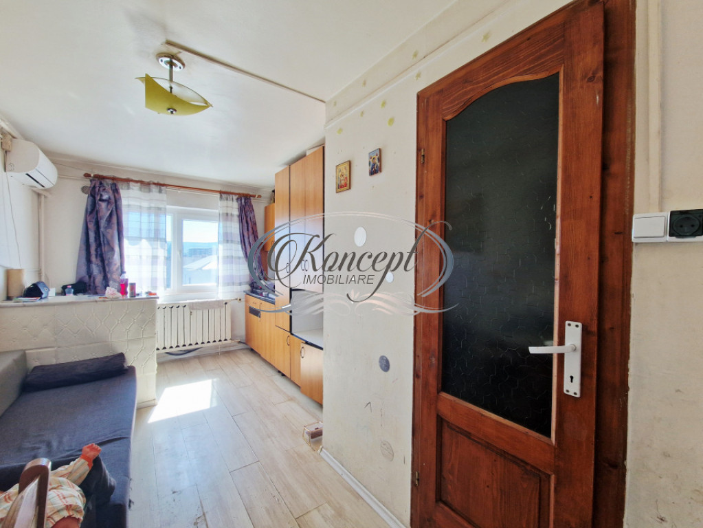 Garsoniera cu orientare sud si finisaje clasice in cartierul