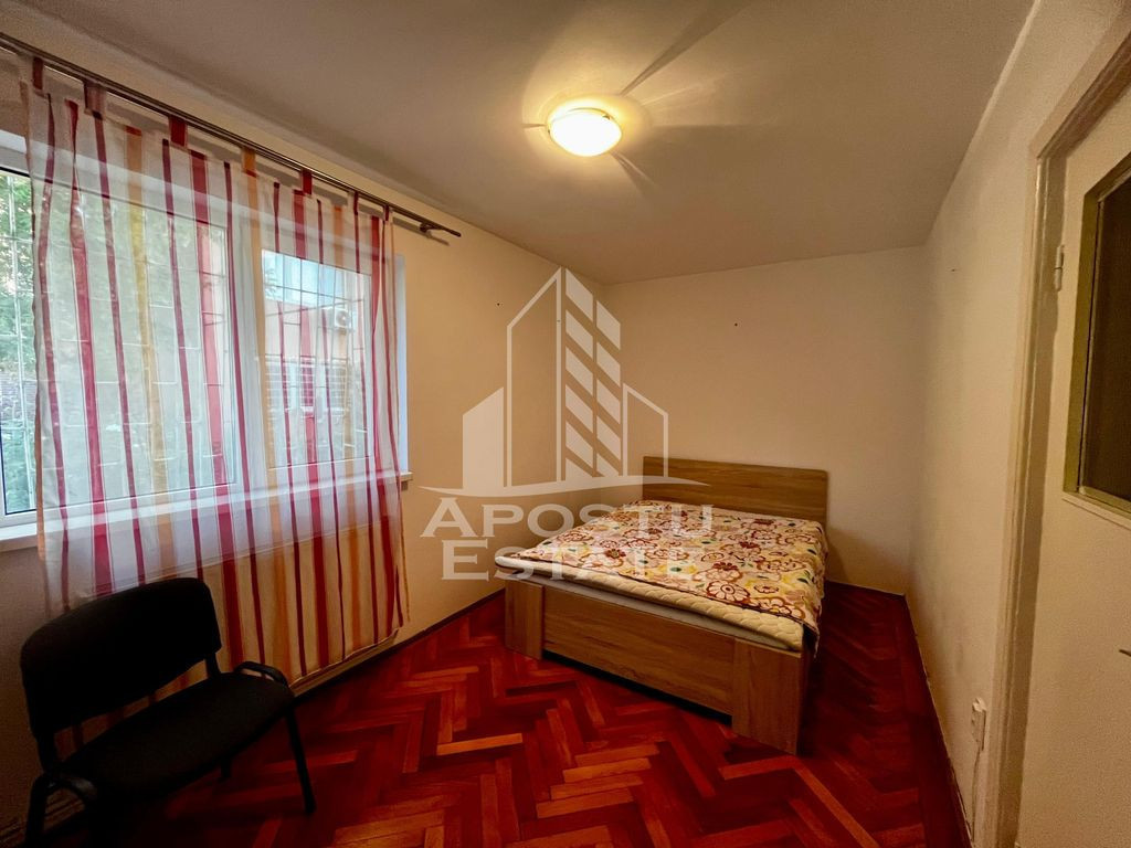 Apartament cu 2 camere, parter,centrala proprie,zona Olim...